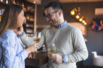Couple in a restaurant waiting for a table