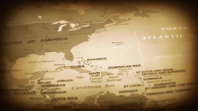 Vintage World Map Flight Over Background/ 4k animation of a vintage historical world map travel background flight over with ocean, countries and cities names