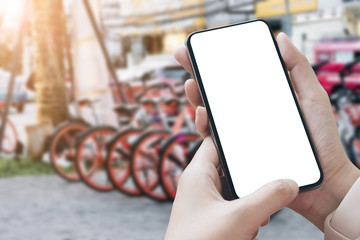 woman using Smartphone. Blank screen mobile phone for graphic display montage.networking service.