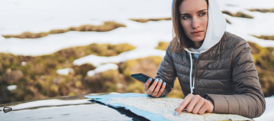 hold in hands mobile phone and look on map, relax tourist travels by auto car, people planning trip...