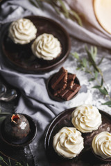 Sweet pastries, muffins and cupcakes on the table
