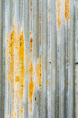 rusty metal distressed background. scratched profiled sheet. grunge old weathered backdrop. iron texture. copyspace concept