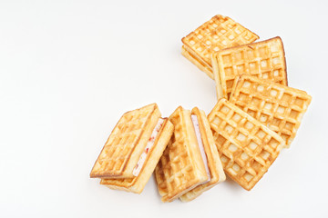 Belgian waffles on a white background. Waffles lined in a semicircle.