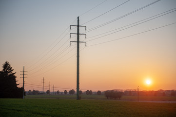 Fototapeta na wymiar Powerlines in the Flemish Country side