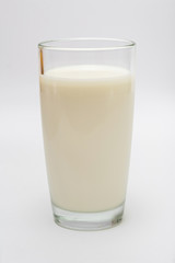 glass of milk on a white background
