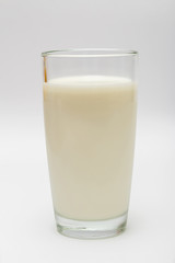 glass of milk on a white background