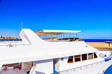 White luxury yacht in a sea harbor of Hurghada, Egypt
