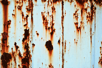 Very red corrosion on a blue background