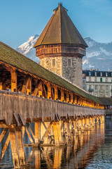 The Chapel bridge with Mount Pilatus in the background, Lucerne (Luzern), Central Switzerland.