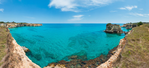 Obraz premium Faraglioni at Torre Sant Andrea, Italy.