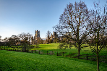 Park and view on Ely Cathedral, Anglo-Saxon abbey, UK