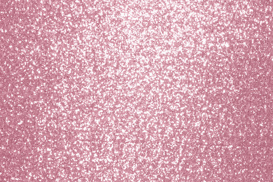 Sparkling pink, rose, sequin textile background. Fashion fabric glitter, sequins