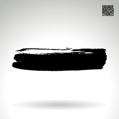 Fototapeta premium Black brush stroke and texture. Grunge vector abstract hand - painted element. Underline and border design.