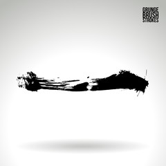 Black brush stroke and texture. Grunge vector abstract hand - painted element. Underline and border design.