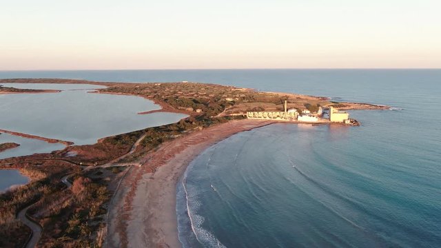 Aerial pull out descending view of the nature reserve of Vendicari on the coast of Sicily