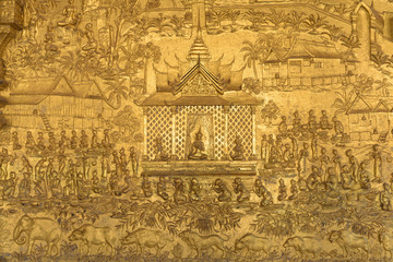Bas-relief detail at the Xieng Wat Thong tempe in Luang Prabang, Laos.