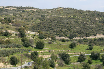 Fototapeta na wymiar Mountain slope with a road