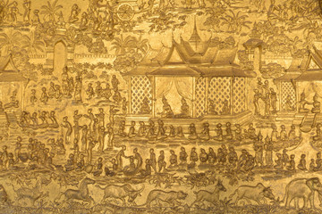 Bas-relief detail at the Xieng Wat Thong tempe in Luang Prabang, Laos.