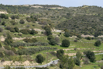 Fototapeta na wymiar Mountain slope with a road