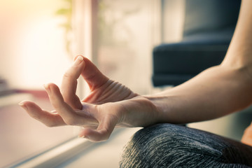 hand closeup with yoga gesture