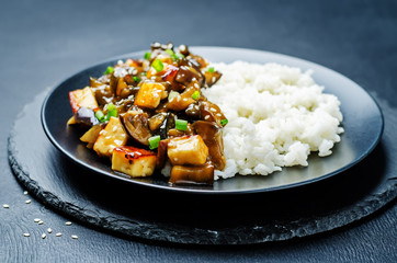 Eggplant tofu teriyaki with rice and sesame sprinkle