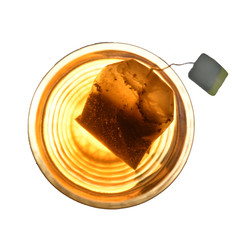 transparent cup of tea with tea bag
