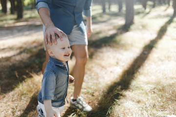 Little boy with the father in the park