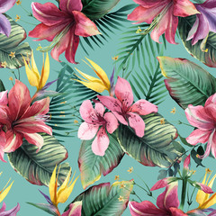 Watercolor seamless pattern of tropical flowers and leaves on blue background