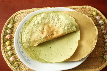 indian traditional food lunch or tea time snack papad or papadum roasted and raw dried