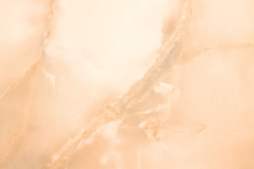 Fototapeta premium ceramic tile with a pattern of natural marble of orange color