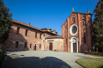Fototapeta premium Abbey of Viboldone, in the province of Milan, with the historic main door and columns