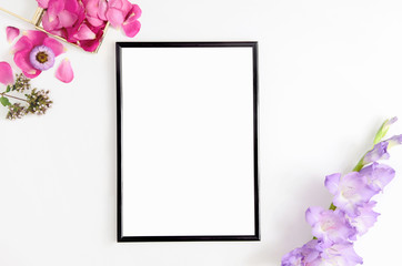 Styled flatlay  - A4 frame with flowers, vertical