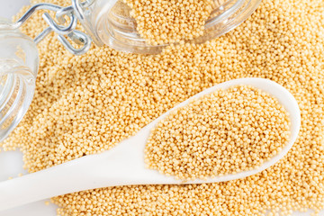 amaranth beans in spoon and glass bowl