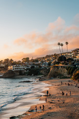 View of beach and cliffs at sunset, in Laguna Beach, Orange County, California © jonbilous
