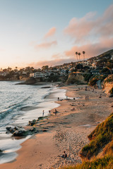 View of beach and cliffs at sunset, in Laguna Beach, Orange County, California