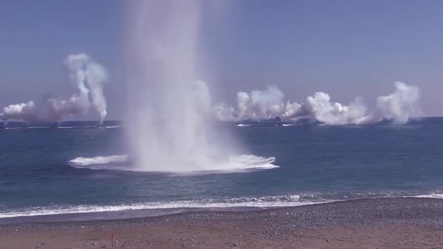Controlled explosion underwater near a beach
