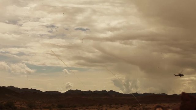 Helicopter throwing projectiles in the desert of Arizona