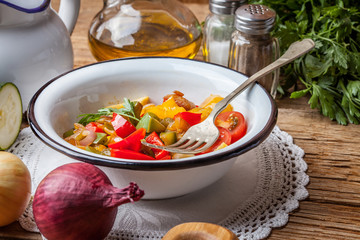 Ratatouille on a rustic table.