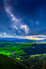 Valley sunshine and storm clouds