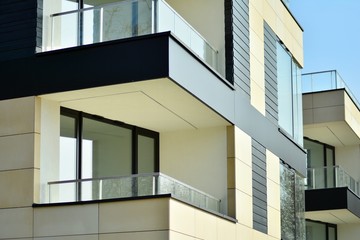 Fragment of a modern apartment building in front. Very modern apartment house.