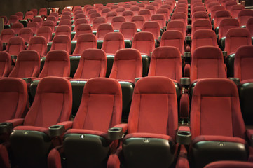 Obraz premium part of a theatre, or similar building, where the people who are watching and listening sit