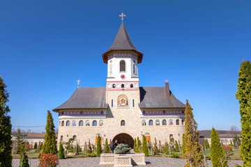 Zosin monastery in Moldavia on a sunny day in spring with bright blue sky.