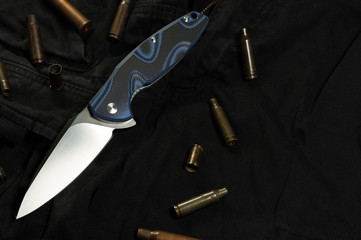 Folding pocket knife and sleeves. Cartridge and gun sleeves.