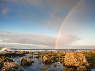 Rainbow over ocean, Galway bay, Ireland.