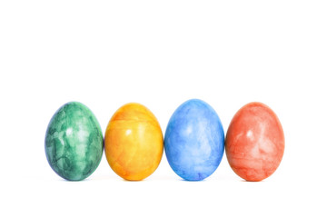 Easter eggs in a row isolated on white background