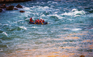 adventure water sports, white water rafting in River Ganges Rishikesh India. Raft in action image  