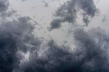 Fototapeta na wymiar original dark clouds before heavy rain. background of sky and storm.