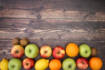 Healthy life - Fruits and vegetables on wooden background