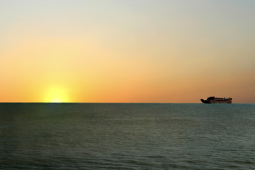 Fototapeta na wymiar a beautiful sunrise appears on the high seas
