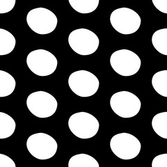 Abstract polka dot pattern with hand drawn dots. Cute vector black and white polka dot pattern. Seamless monochrome polka dot pattern for fabric, wallpapers, wrapping paper, cards and web backgrounds.